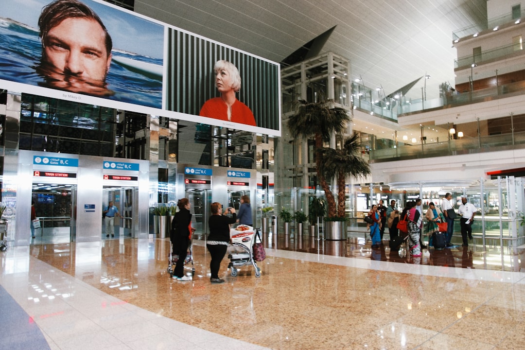 Traveler arriving at Dubai airport for chauffeur pickup