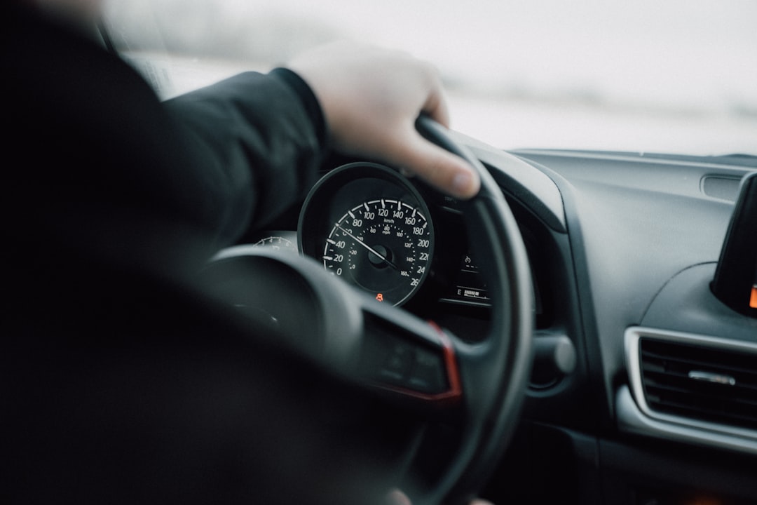 Professional chauffeur driving a client in Dubai