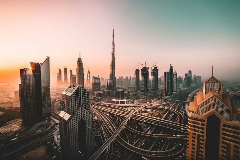 Downtown Dubai skyline and Burj Khalifa at sunrise, a typical morning commute for a monthly driver in Dubai